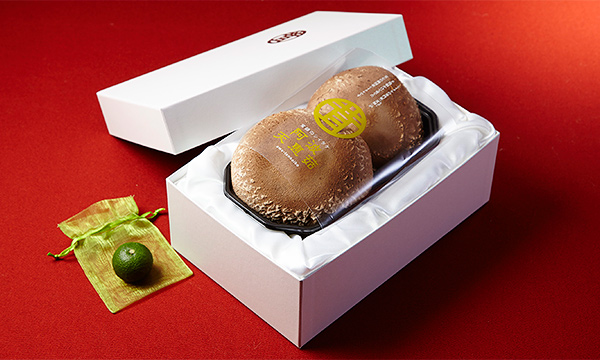 プレミアム椎茸「天恵菇」(てんけいこ)の箱画像